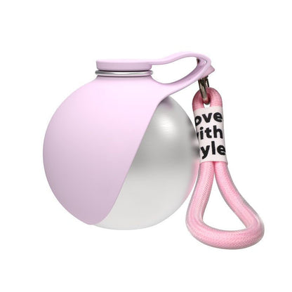 Two-toned pink and white ball with a pink keychain on a white background
