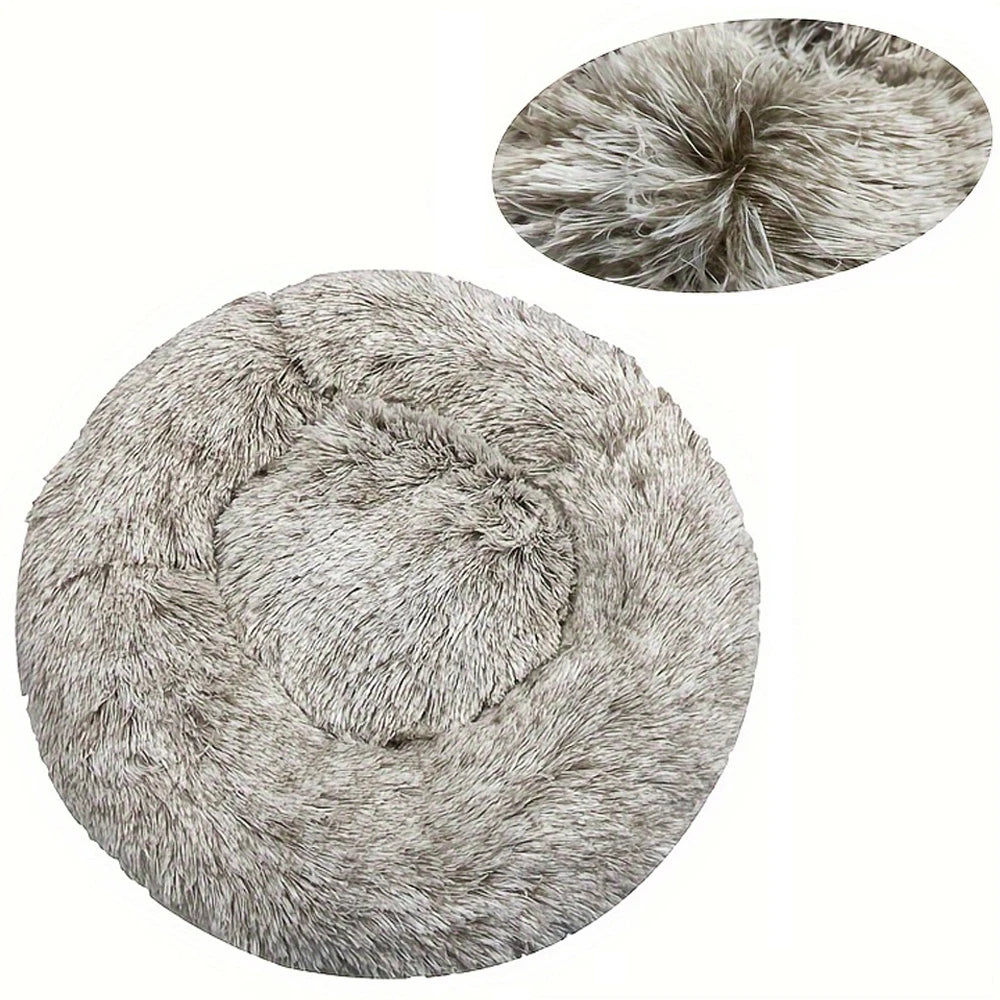Round fluffy pet bed with close-up of texture on a white background