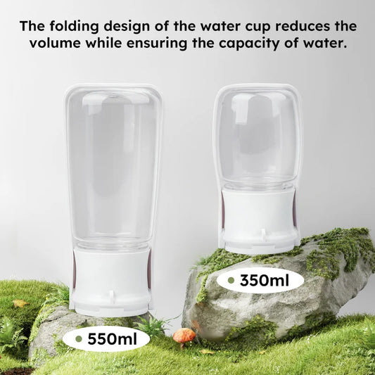 Two transparent water cups with volume labels on a natural background