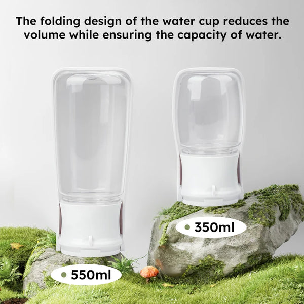 Two transparent water cups with volume labels on a natural background