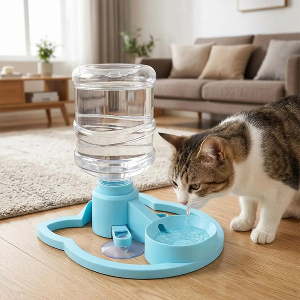 A cat drinking water from a light blue automatic pet water fountain with a large clear water jug, shown in a cozy living room setting.