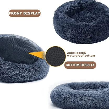 Navy blue pet bed with an antislip and waterproof bottom feature on a white background.
