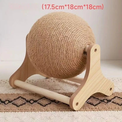 Wooden yarn holder with a ball of yarn on a textured surface