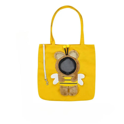 Yellow tote bag with a bee-themed design on a white background