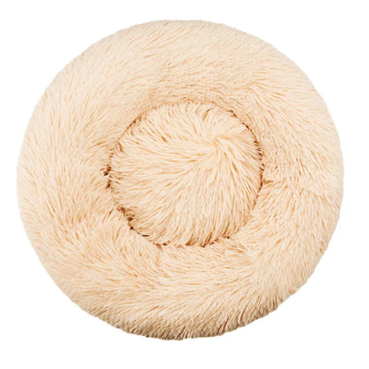 Beige fluffy ball of yarn on a white background