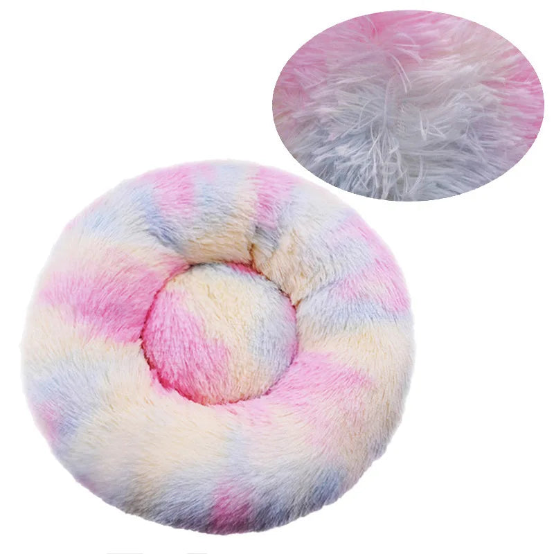 Pastel tie-dye donut pillow with close-up of texture on a white background
