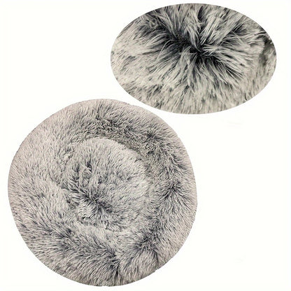 Two gray fluffy round mats on a white background