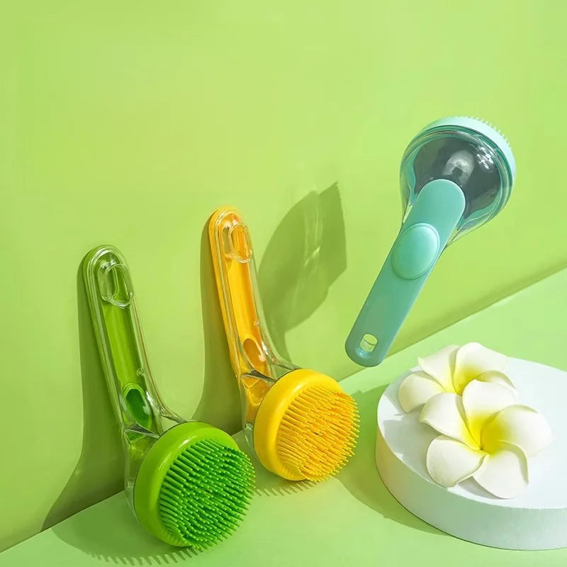Three colorful scrub brushes on a green background with a white flower.