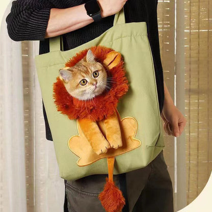 Person holding a green tote bag with a cat in a lion costume design.