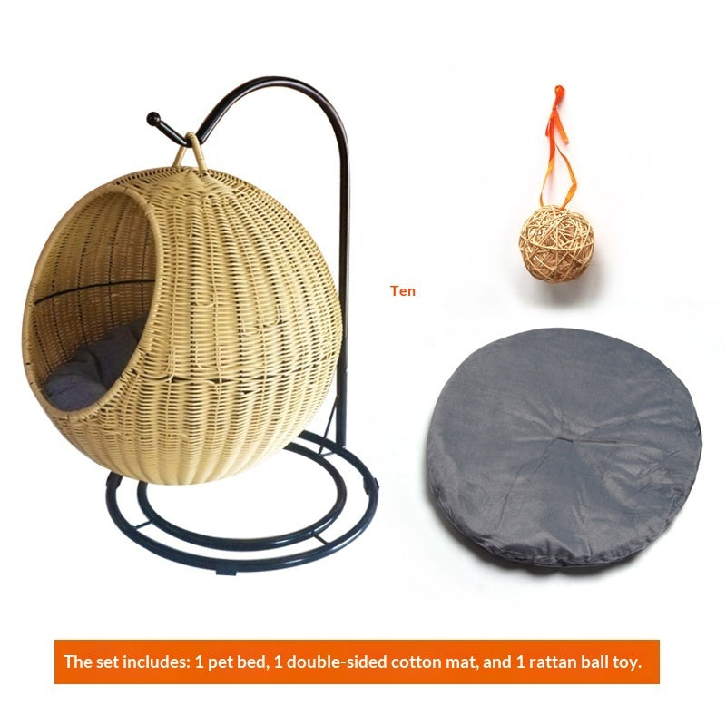 Wicker pet bed, double-sided cotton mat, and rattan ball toy on a white background