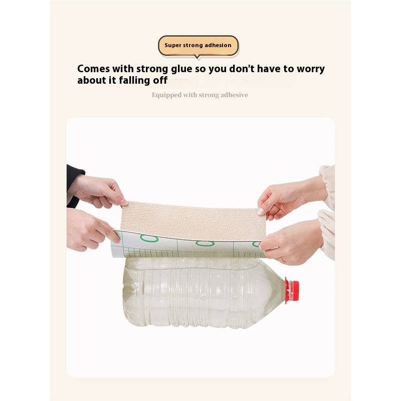 Person applying a roll of paper to a bottle with text about strong adhesion.